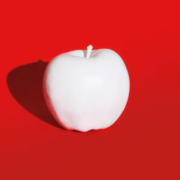 whiteapple redbackground biz gettyimages 740523449
