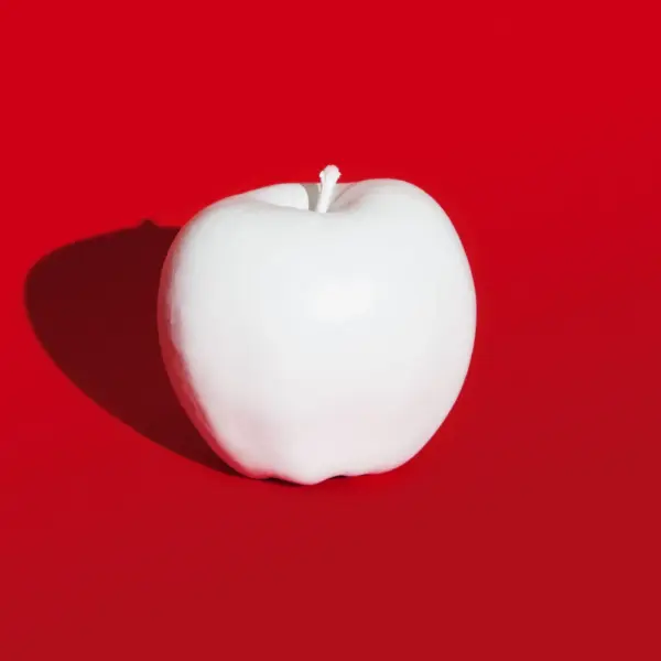 whiteapple redbackground biz gettyimages 740523449