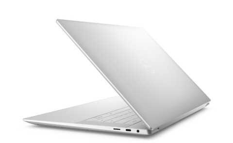 Белый ноутбук Dell XPS 2024 с открытым экраном и клавиатурой сзади слева