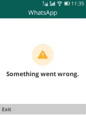 Экран смартфона с ошибкой WhatsApp на KaiOS и предупреждающим знаком