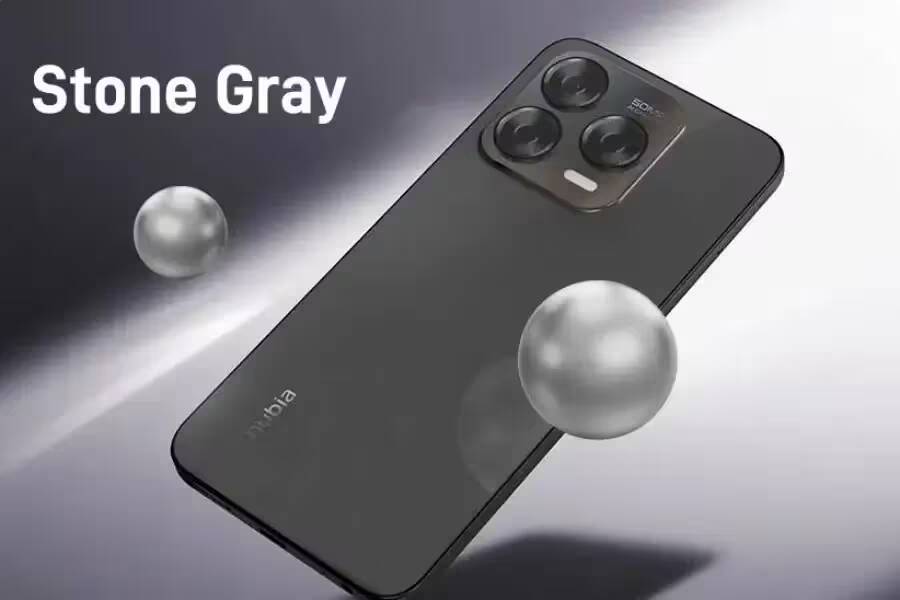 Смартфон Nubia V70 серого цвета с тремя объективами камеры и двумя прозрачными шариками