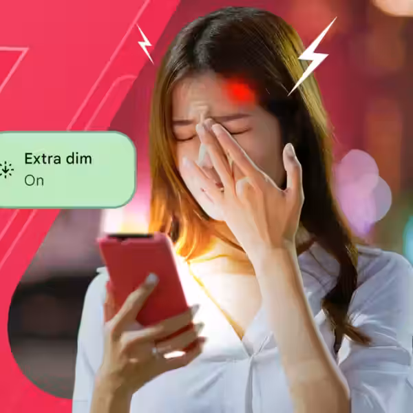 woman with a migraine looking at a phone featuring a green extra dim on toggle overlay