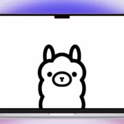 Логотип Ollama на экране MacBook с белым фоном