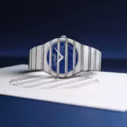 Часы Piaget с синим циферблатом и серебряным корпусом
