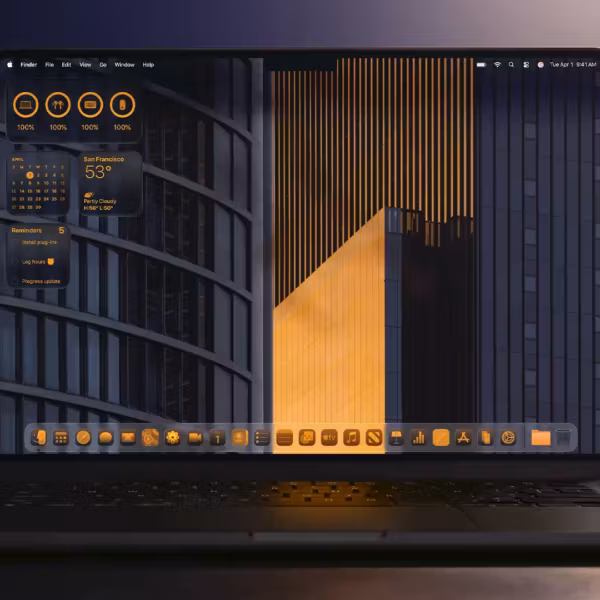 ноутбук с тёмным интерфейсом macOS Liquid Glass