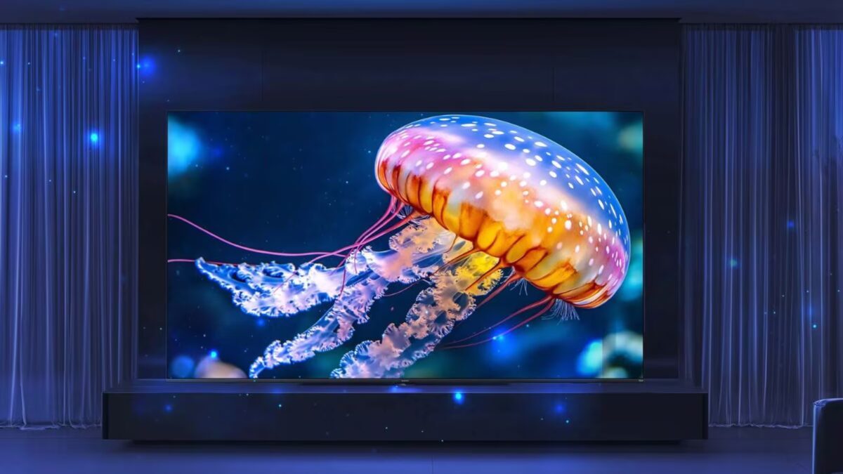 Телевизор Xiaomi TV FX Mini LED на сцене с голубыми шторами