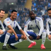 Футболисты в форме Schalke на поле с мячом реклама EA Advertising