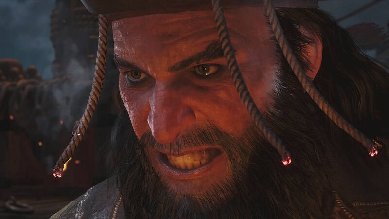 Крупный портрет мужчины с длинными темными волосами и бородой из Assassin’s Creed Black Flag