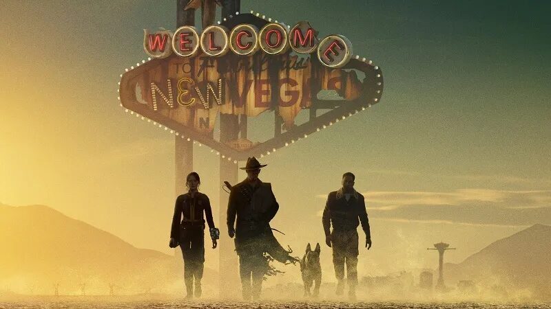 Группа людей и собака на фоне указателя Нью-Вегас в Fallout