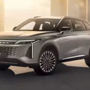 Электрический кроссовер Exeed RX 2025 замаскированный