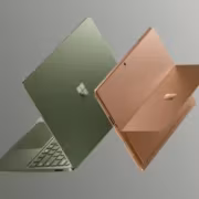 Два ноутбука Surface Laptop 8 и Surface Pro 12 в воздухе