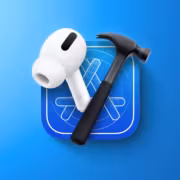 AirPods и молоток на синем фоне чертежи