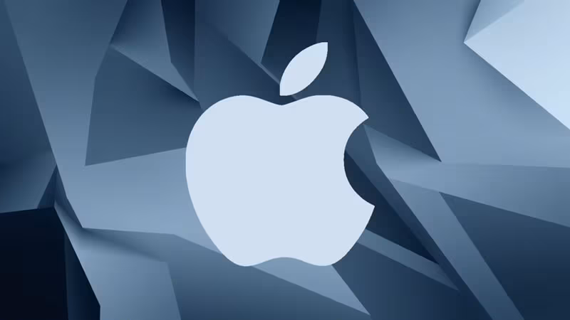 Логотип Apple на фоне цветных геометрических фигур