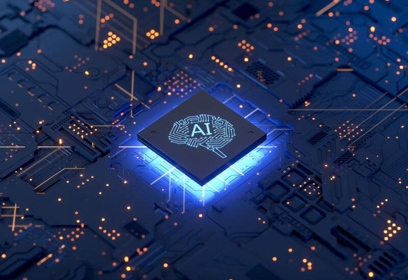 чип с надписью AI на микросхеме на плате