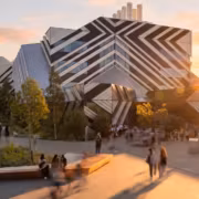 Здание Университета Монаша с суперкомпьютером MAVERIC на фоне sunset