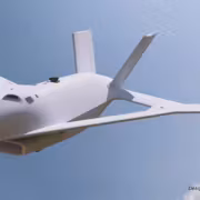 Беспилотник X-65 Aurora в полёте над облаками