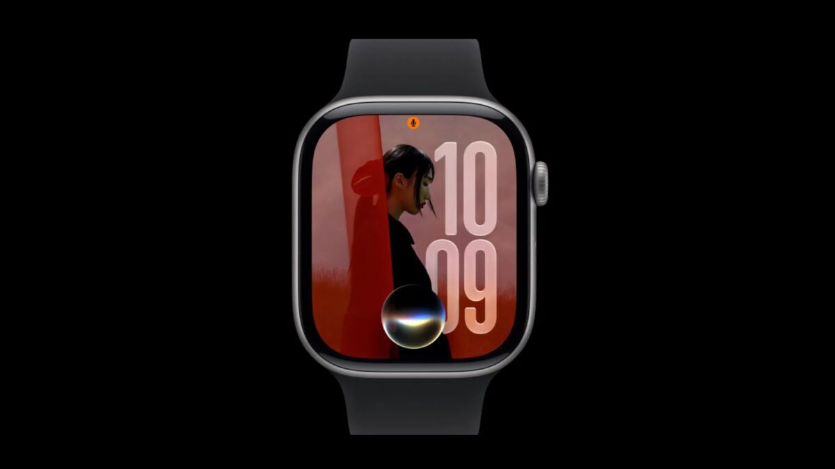 Apple Watch Series 9 showing lock screen with red background