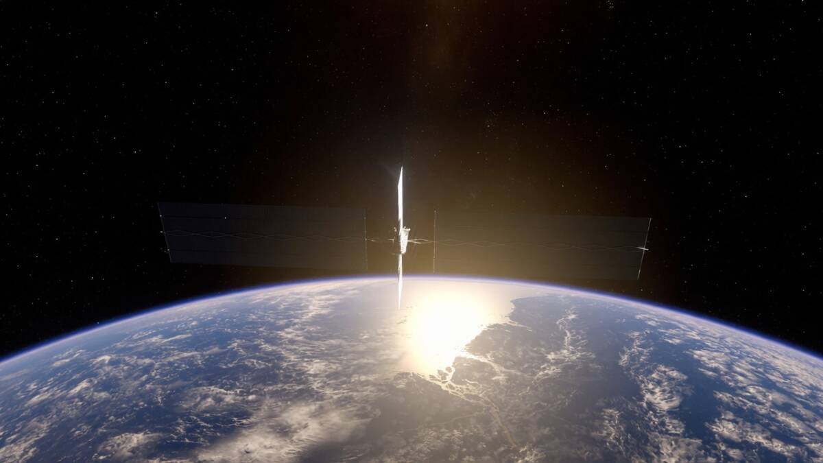 Космический спутник SpaceX над землёй с солнечными панелями