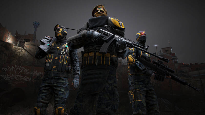 Три бойца Ghost Recon в тёмной форме с оружием Ubisoft