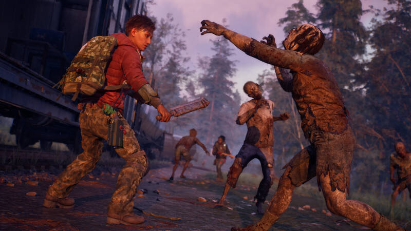 игрок с топором сражается с зомби в игре Undead Labs