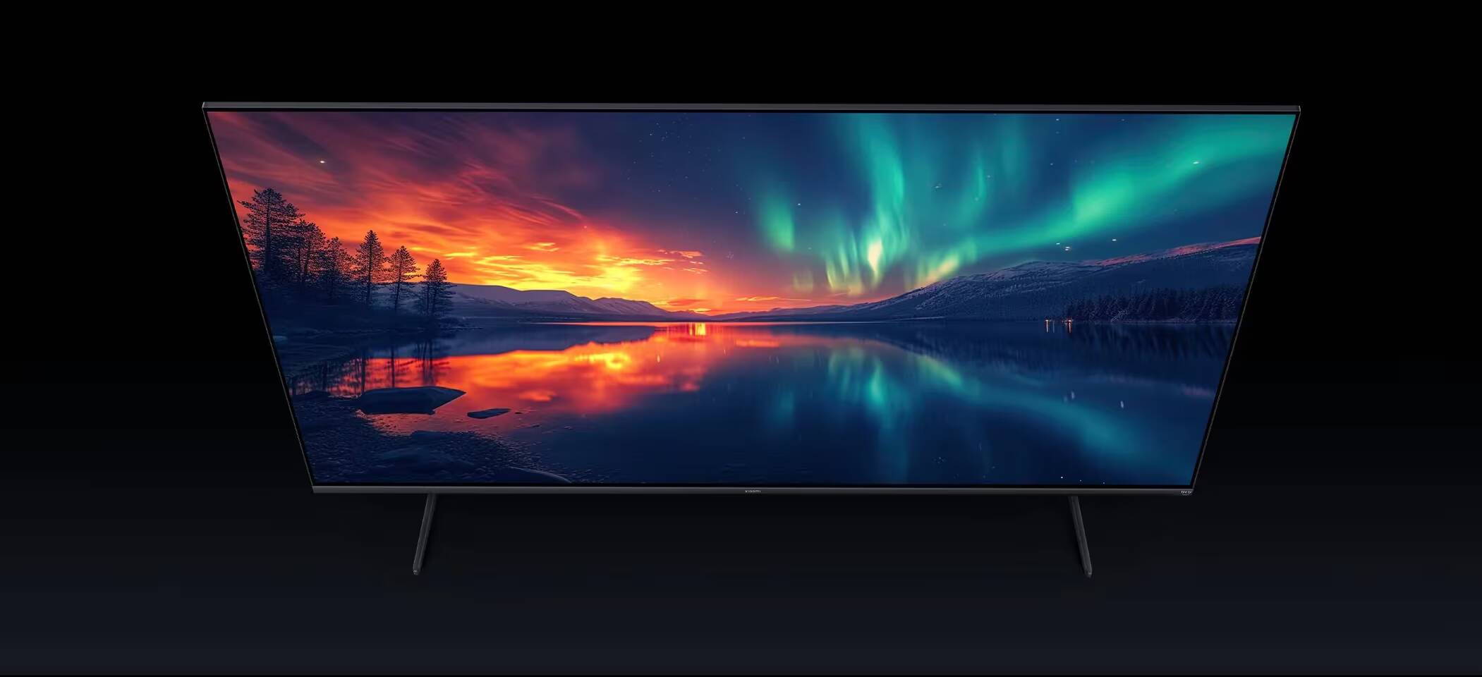 Телевизоры Xiaomi TV FX Mini LED 2026 вышли в Европе 1 Телевизор Xiaomi TV FX Mini LED 2026 отображает пейзаж с северным сиянием