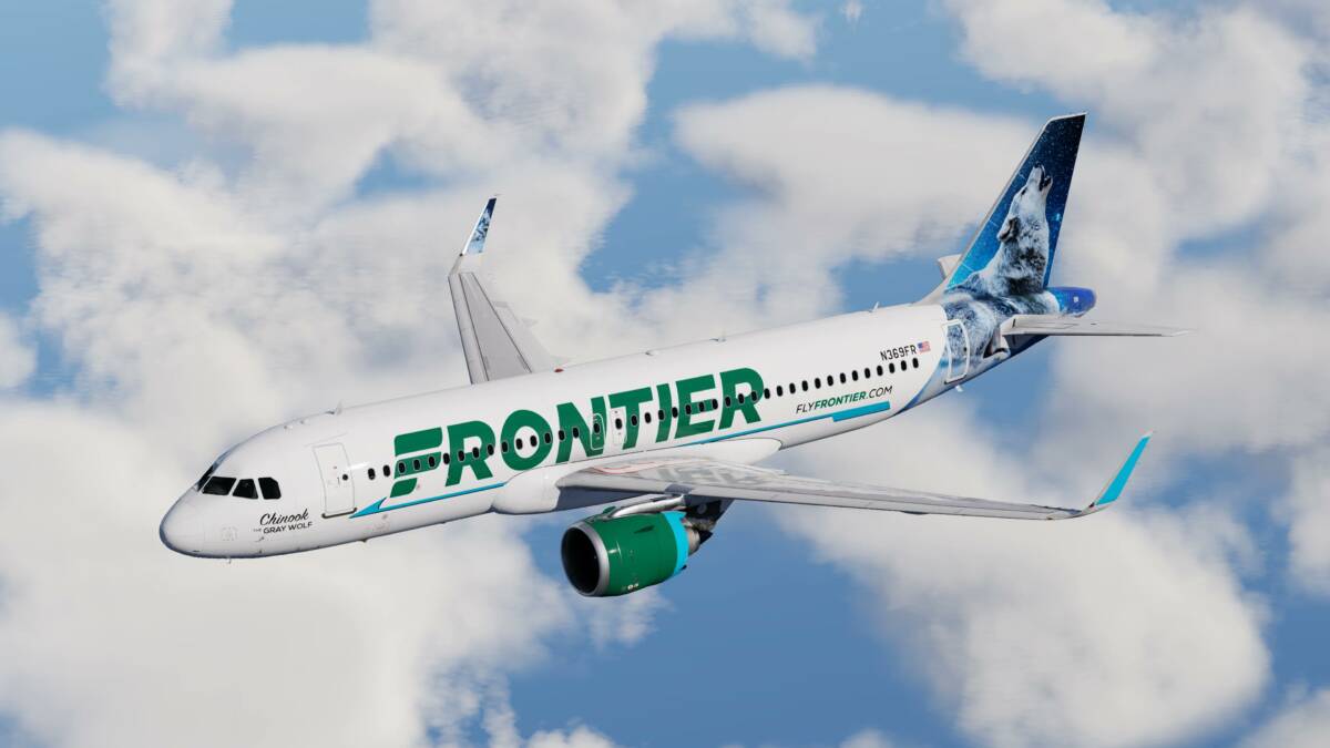 Самолет Frontier Airlines с изображением волка и звездного неба на хвосте