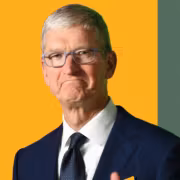 человек в деловом костюме и очках Apple Nvidia капитализация