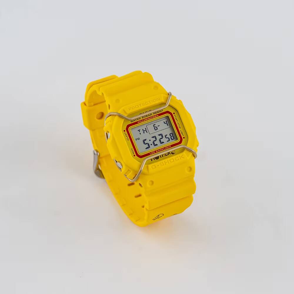 Жёлые часы Casio G-Shock с металлическими защитными дугами