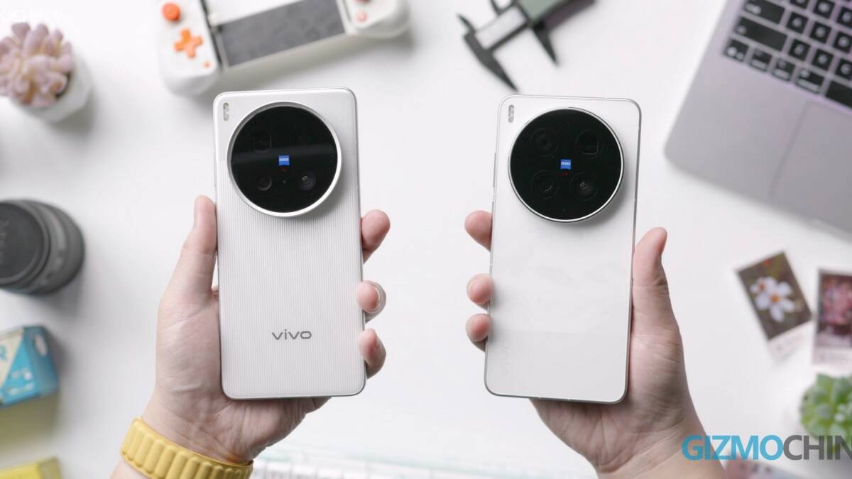 Две смартфона Vivo и один iPhone 14 Pro в руках