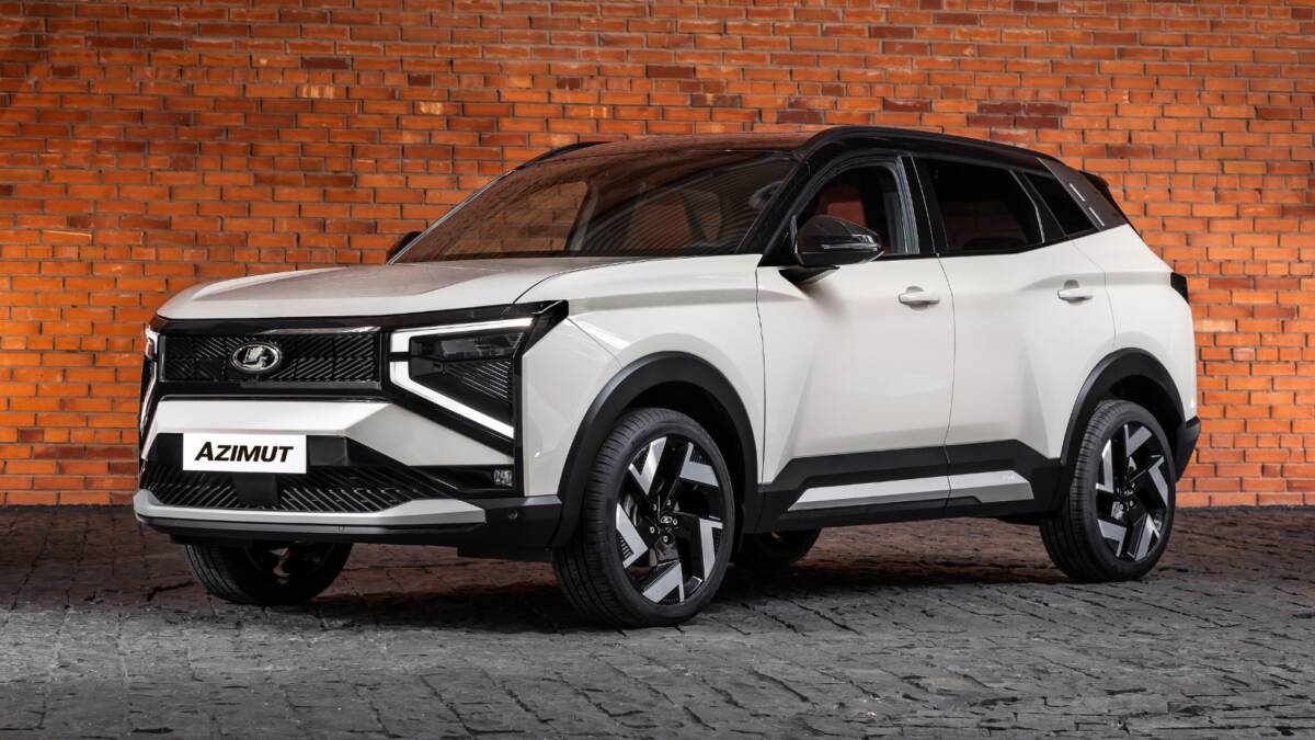 Новый Lada Azimut белый кроссовер на кирпичной стене