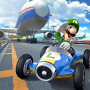 Марио в гоночной машине из Mario Kart перед самолетом
