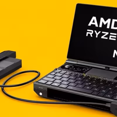 GPD WIN Max 3 с отсоединяемым аккумулятором на жёлтом фоне