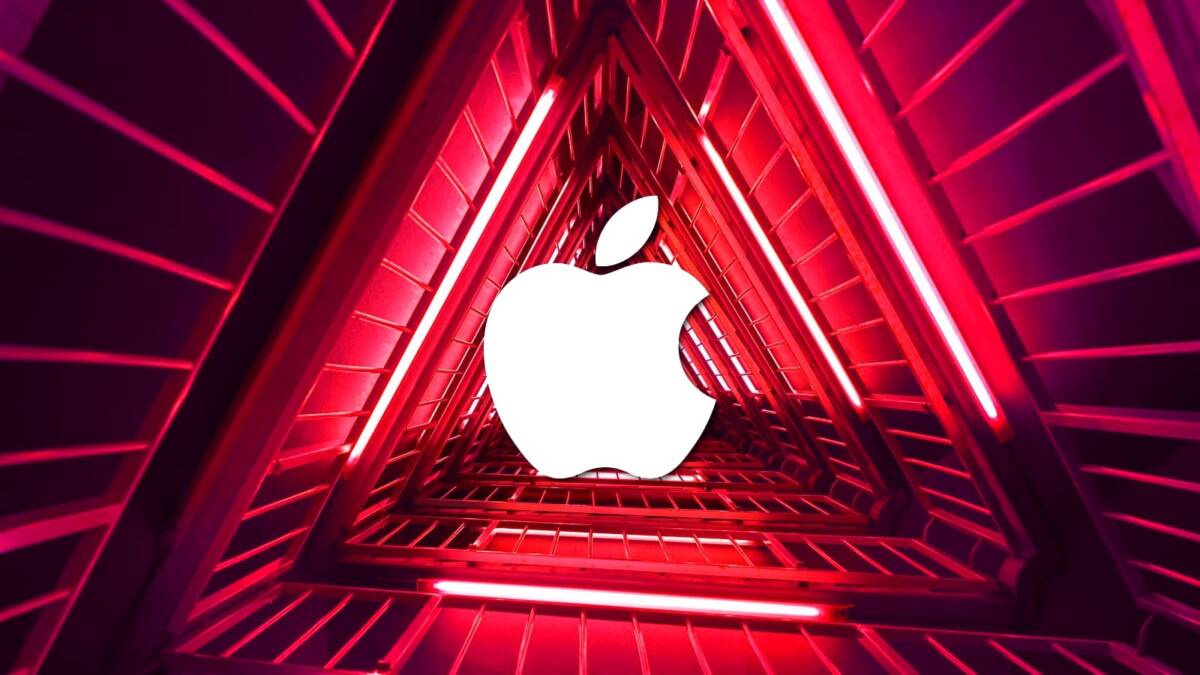 AmnesiaStealer на macOS угоняет браузерные сессии через скрытое удалённое управление 4 Логотип Apple внутри красных неоновых треугольников на MacBook