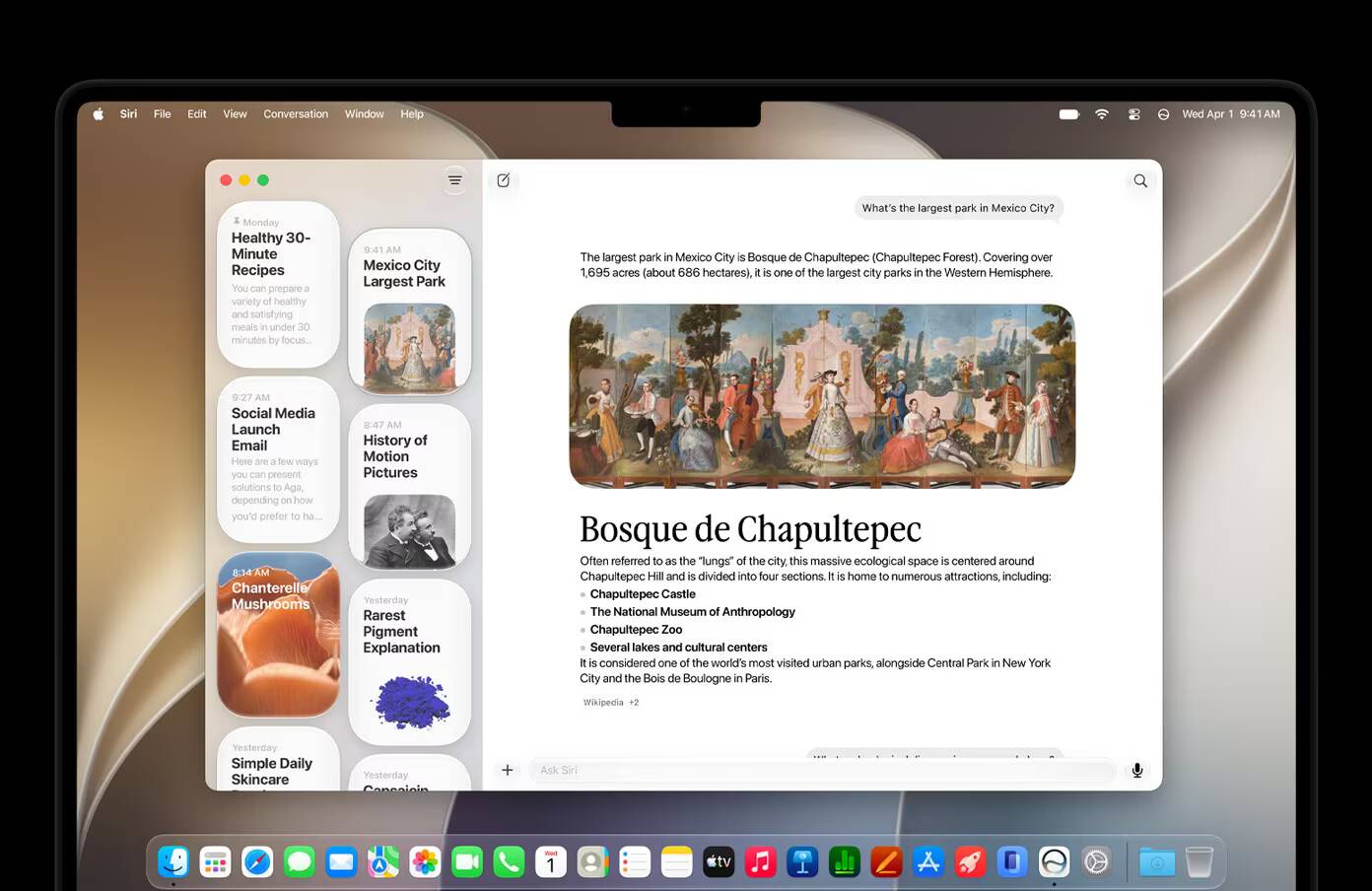 Экран MacBook с открытым приложением Safari, отображающим статью о macOS 27 и Siri