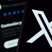 Логотип X на смартфоне планшете иконках X