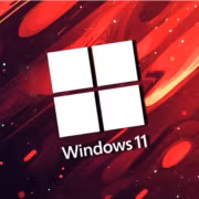 Логотип Windows 11 на красном фоне с абстрактным дизайном