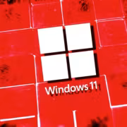 Логотип Windows 11 на красной технологической сетке
