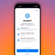 Мобильный телефон с экраном ChatGPT и настройками