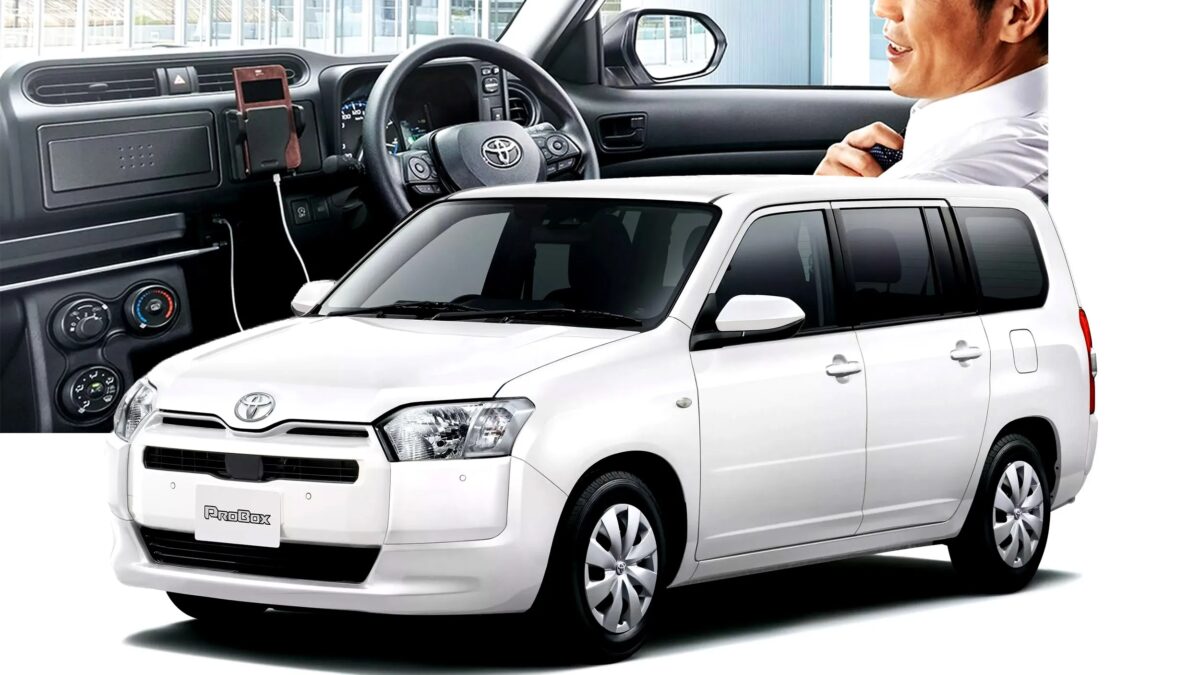 Кузов белого Toyota Probox спереди и сбоку