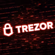 Логотип Trezor на фоне цифрового кода и брандмауэра