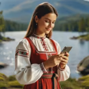 В «Яндекс Переводчике» появились алтайский и карельский языки 2 Девушка в традиционной одежде using Яндекс Переводчик на берегу реки