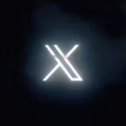 Логотип SpaceXSI с яркими линиями на чёрном фоне