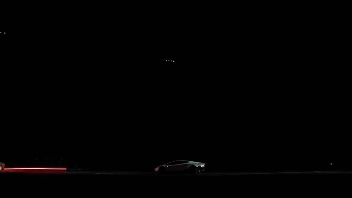 Tesla Roadster с реактивными соплами и светящимися линиями