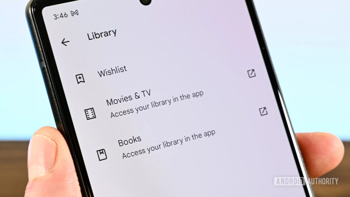 экран телефона с разделом библиотека и списком желаемого Google Play
